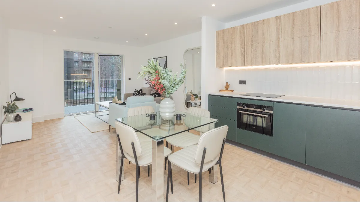 Sofas, a kitchen and dining setups